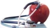 Picure of stethoscope draped around applel 